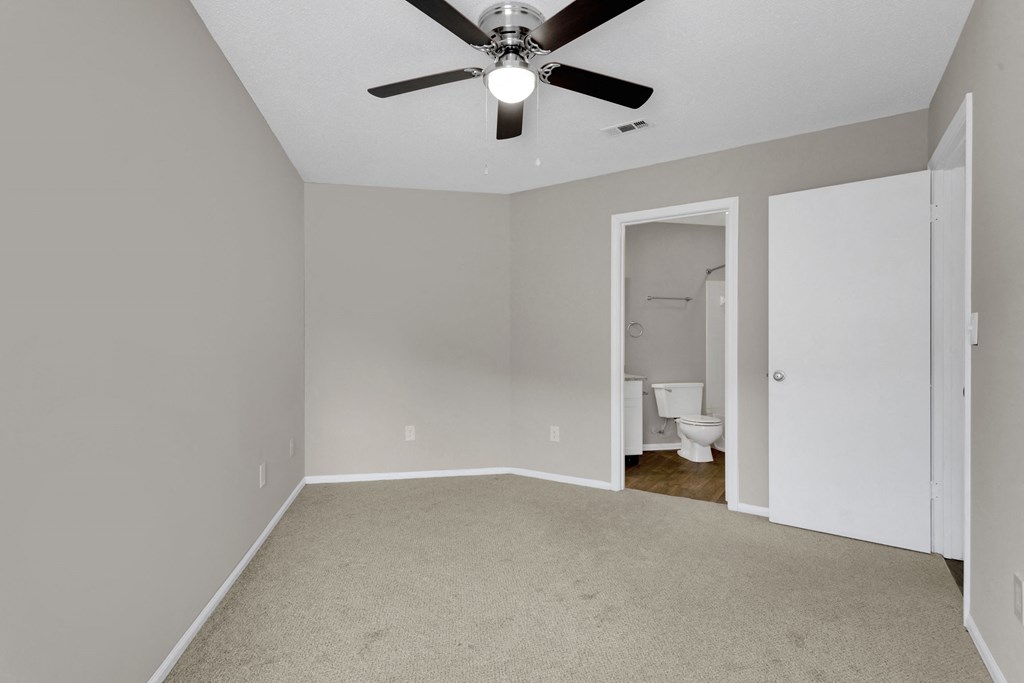 Spacious Bedroom with Plush Carpeting