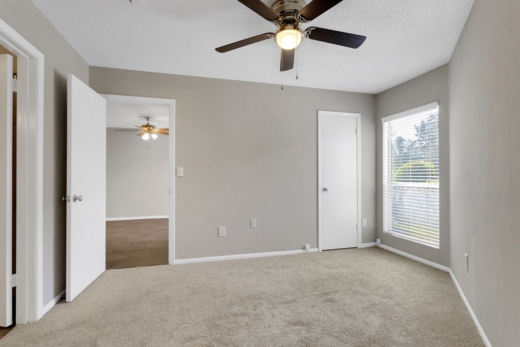Spacious Bedroom with Plush Carpeting