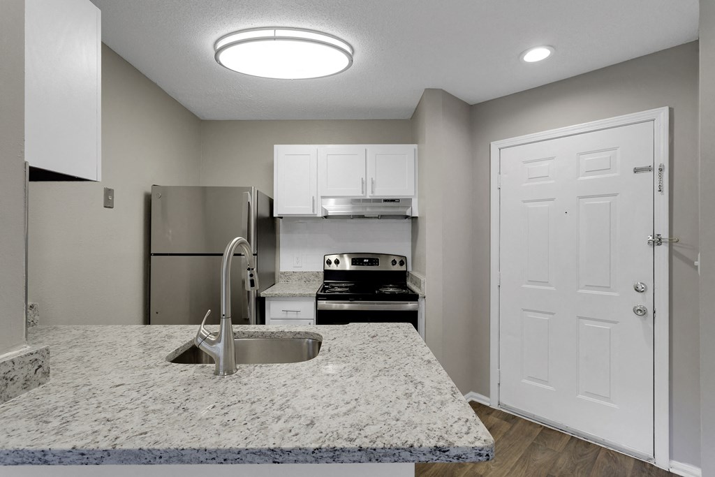 Renovated Kitchen With Stainless Steel Appliances