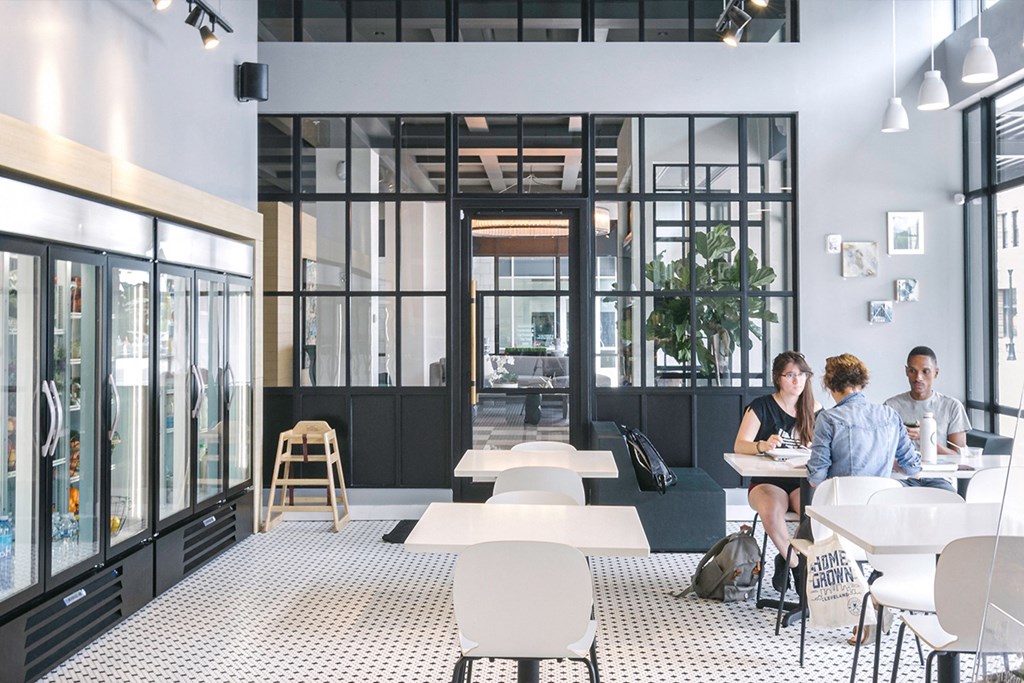 Guests seated at table in The Grocery market
