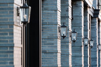 Gas-style lamps on exterior of Quarter Phase 2 Apartment building - Photo Gallery 21