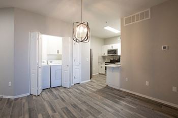 a kitchen and dining area in a 555 waverly unit at Ascent North Scottsdale Apartments, Phoenix, 85054