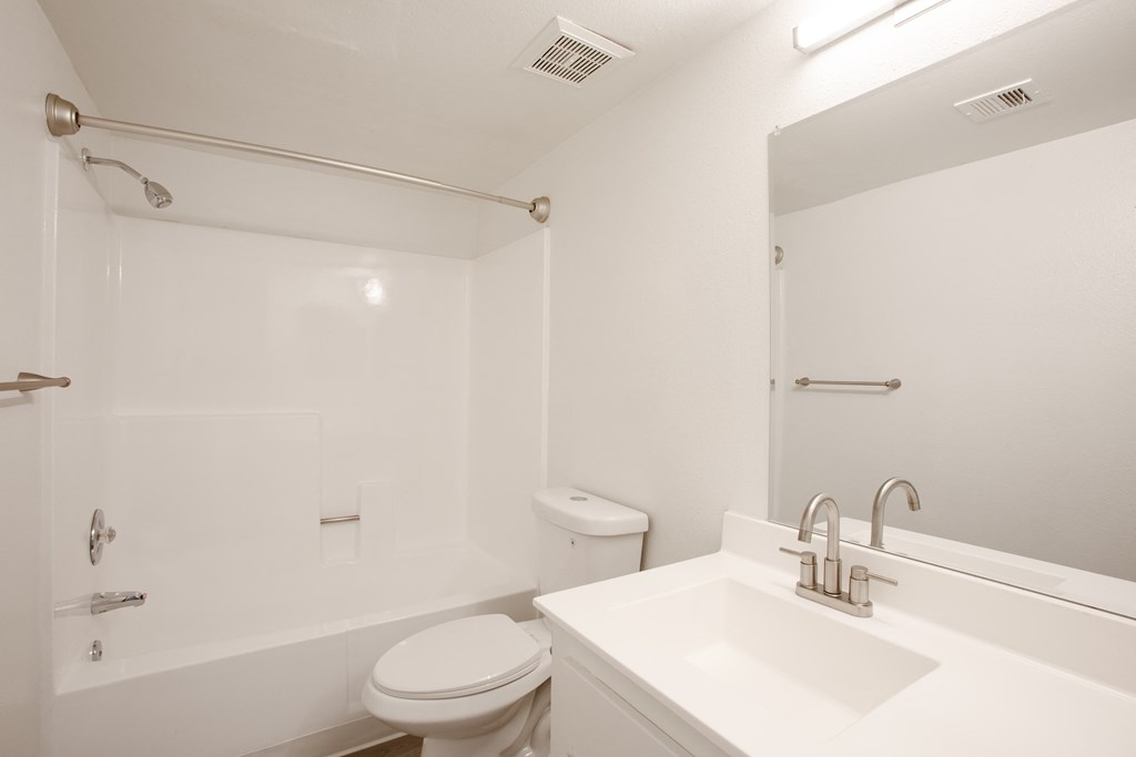 a bathroom with a sink toilet and a shower at Ascent on Peoria Apartments, Phoenix, AZ