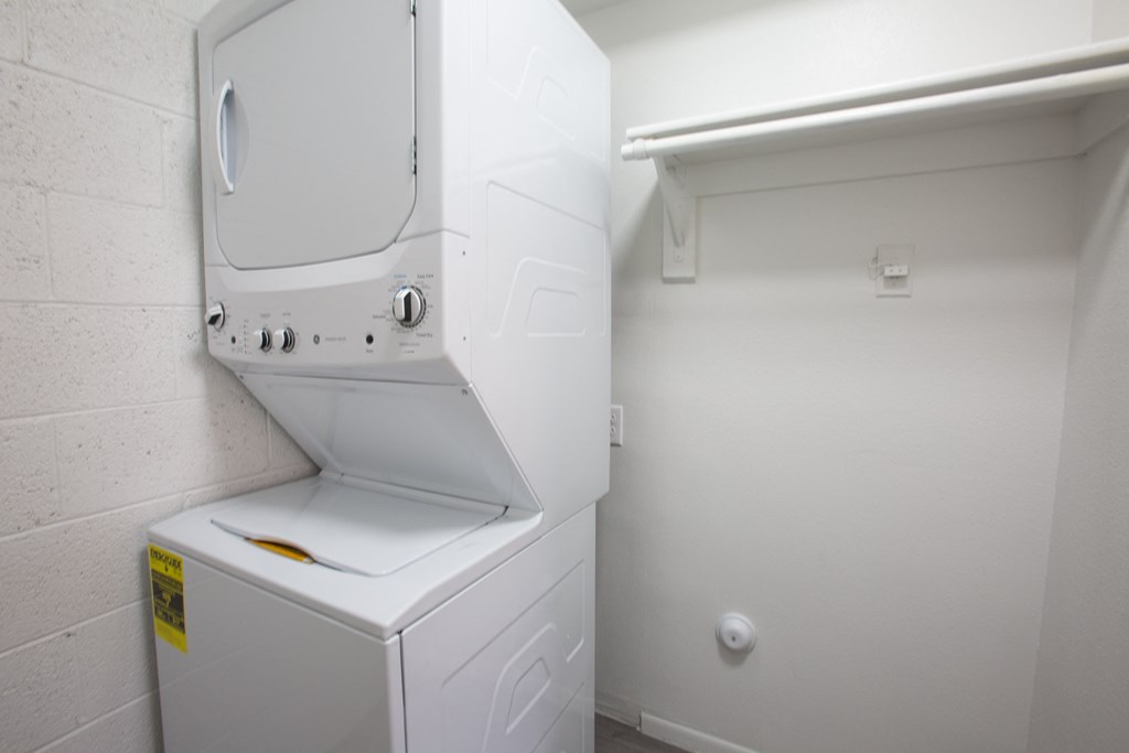 a washer and dryer in a laundry room at Ascent on Peoria Apartments, Phoenix, AZ 85029