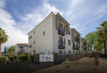 a building with a bike sign in front of it at 60 at Melrose Apartments, Phoenix, AZ