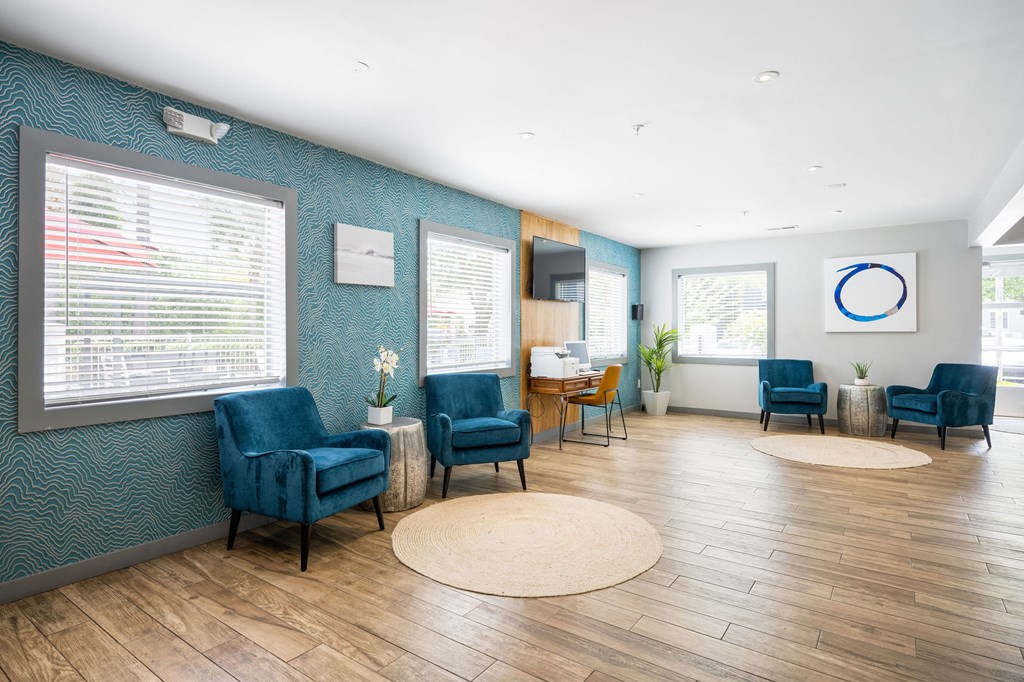 our waiting room is spacious and bright with plenty of seating and a flat screen tv at Nextloft Apartments, Bluffton, 29910