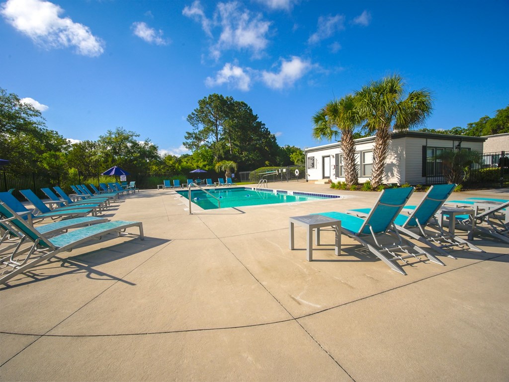 our apartments have a large pool and lounge chairs