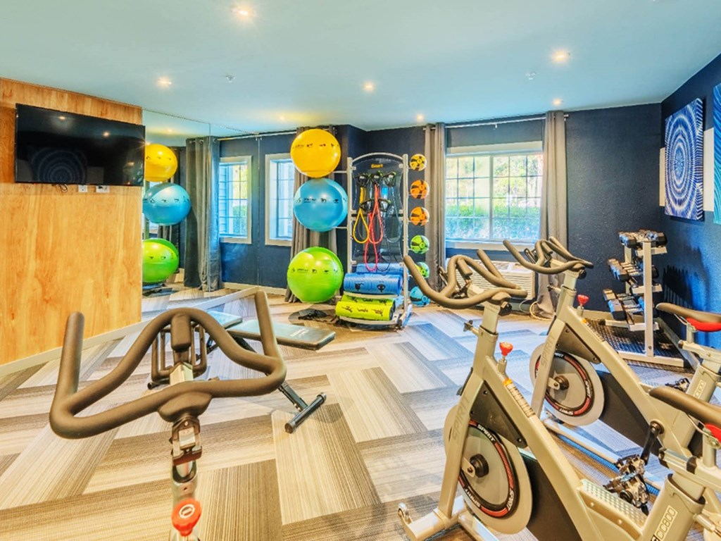 fitness center with weights and cardio equipment at Nextloft, South Carolina, 29910