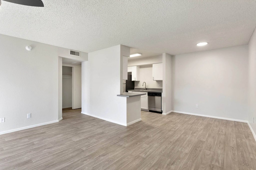apartment living room and kitchen with wood flooring at Paseo 51, Glendale