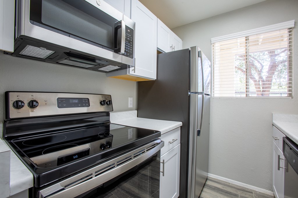 kitchen in Tucson with stainless steel energy appliances at The Vintage Apartments, Tucson, AZ
