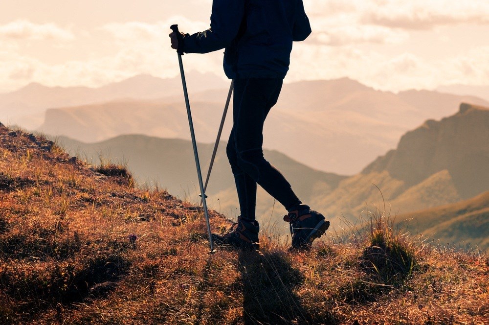 A person hiking on a mountain trail at Ascent on Spence, Tempe 85281
