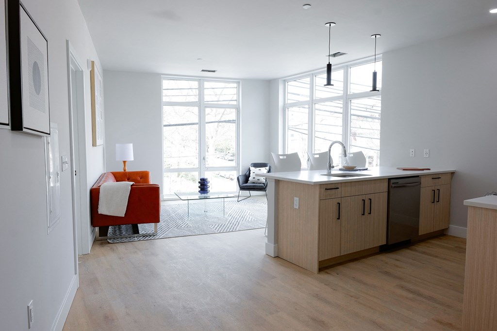 a kitchen and living room in a house