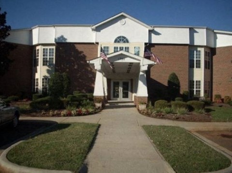 a building with an flag in front of it
