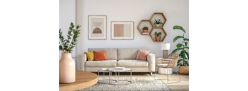 A living room with a grey couch at Mountain Laurel III Apartments, Staunton, VA, 24401