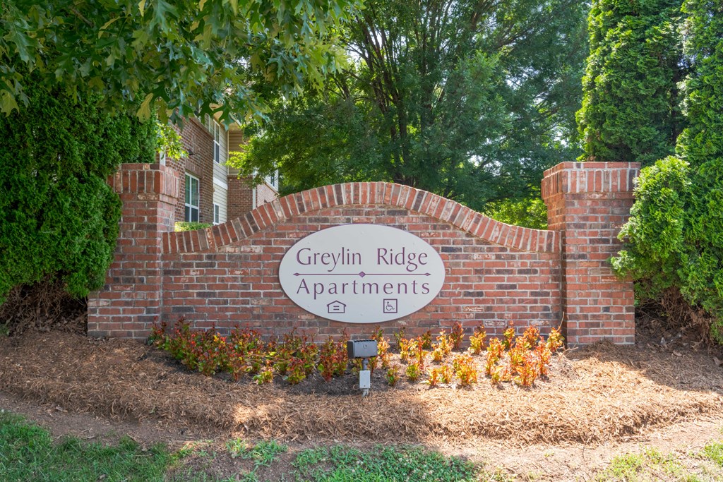 Community sign for Greylin Ridge Apartments.