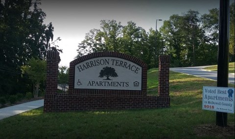 Property Sign at Harrison Terrace Apartments in Marion, NC 28752