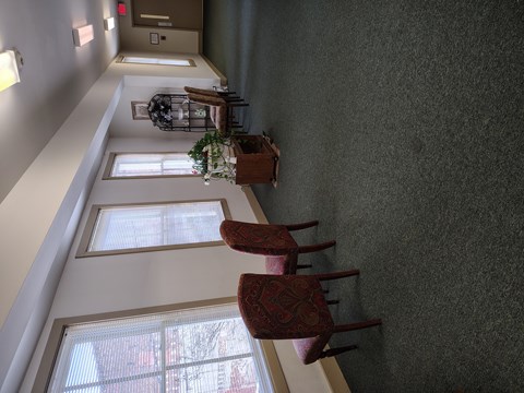 Hallway with Chairs at Vance Senior Housing Apartments, Henderson, 27536