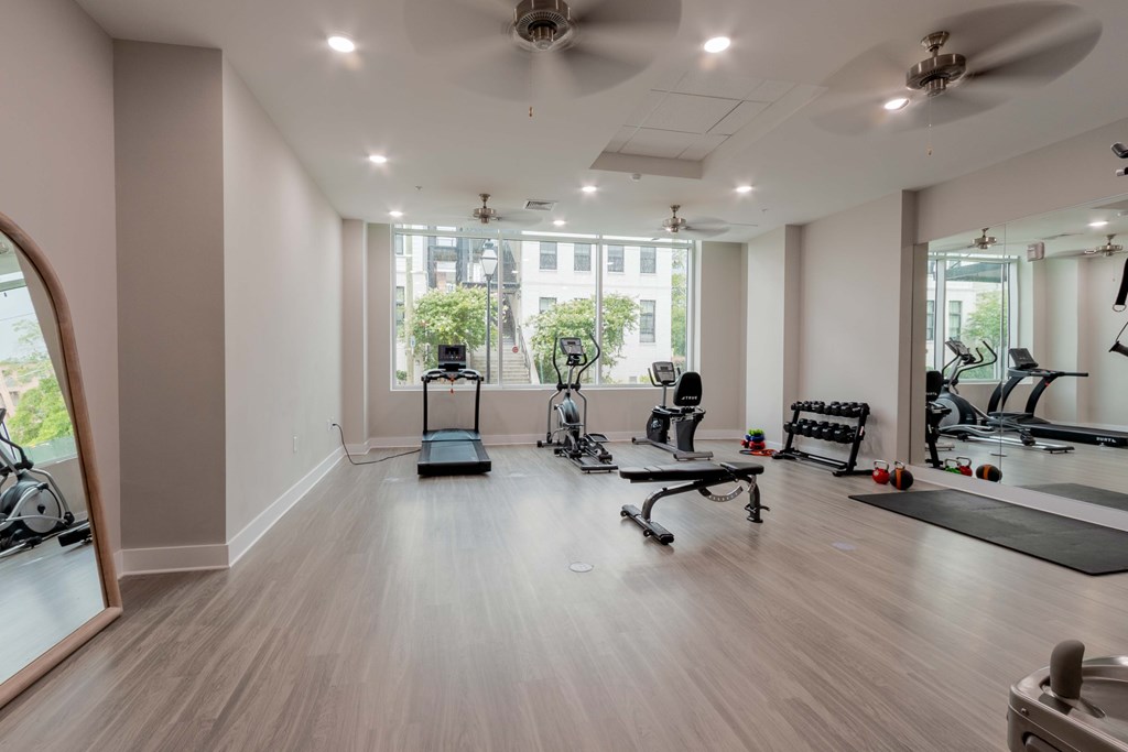Spacious gym with a variety of exercise equipment at James Lewis Jr, Charleston, SC 29403