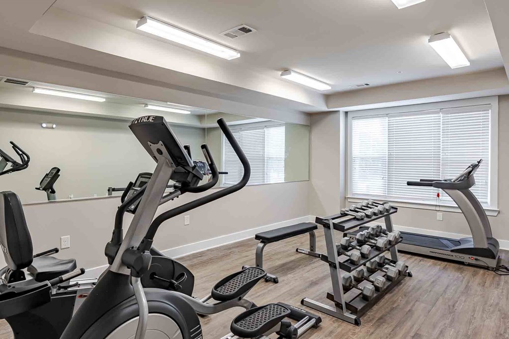 Gym with treadmills and other exercise equipment at Oakside Apartments, Johns Island, South Carolina