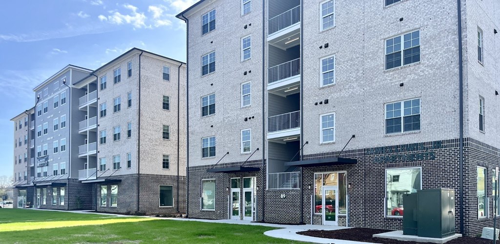 Apartment building with a grassy area at James Lewis Jr, Charleston 