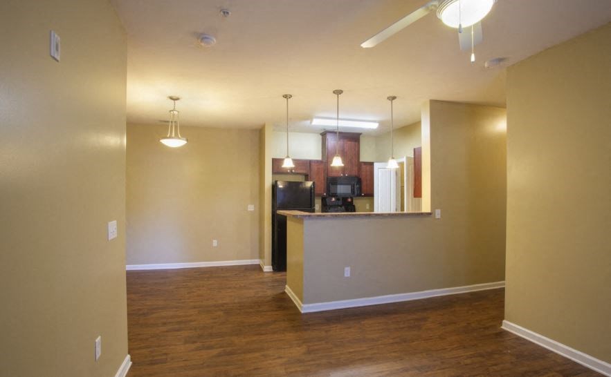 Kitchen and Separate Dining Room at The Parker at Cone Apartments, North Carolina, 29609