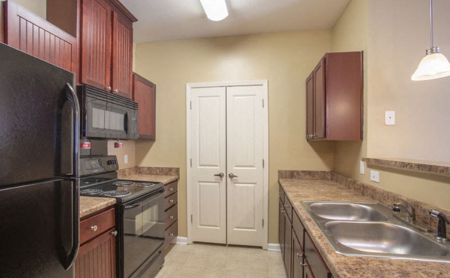 Phase II black appliances at The Parker at Cone Apartments, North Carolina