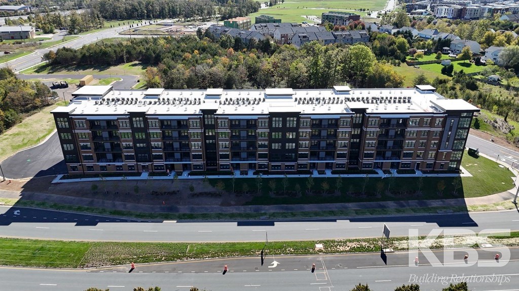 an aerial view of a large building in a city