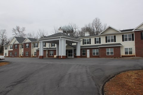 a large building with an empty street in front of it