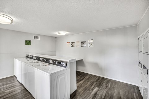 A laundry room with a washer and dryer.