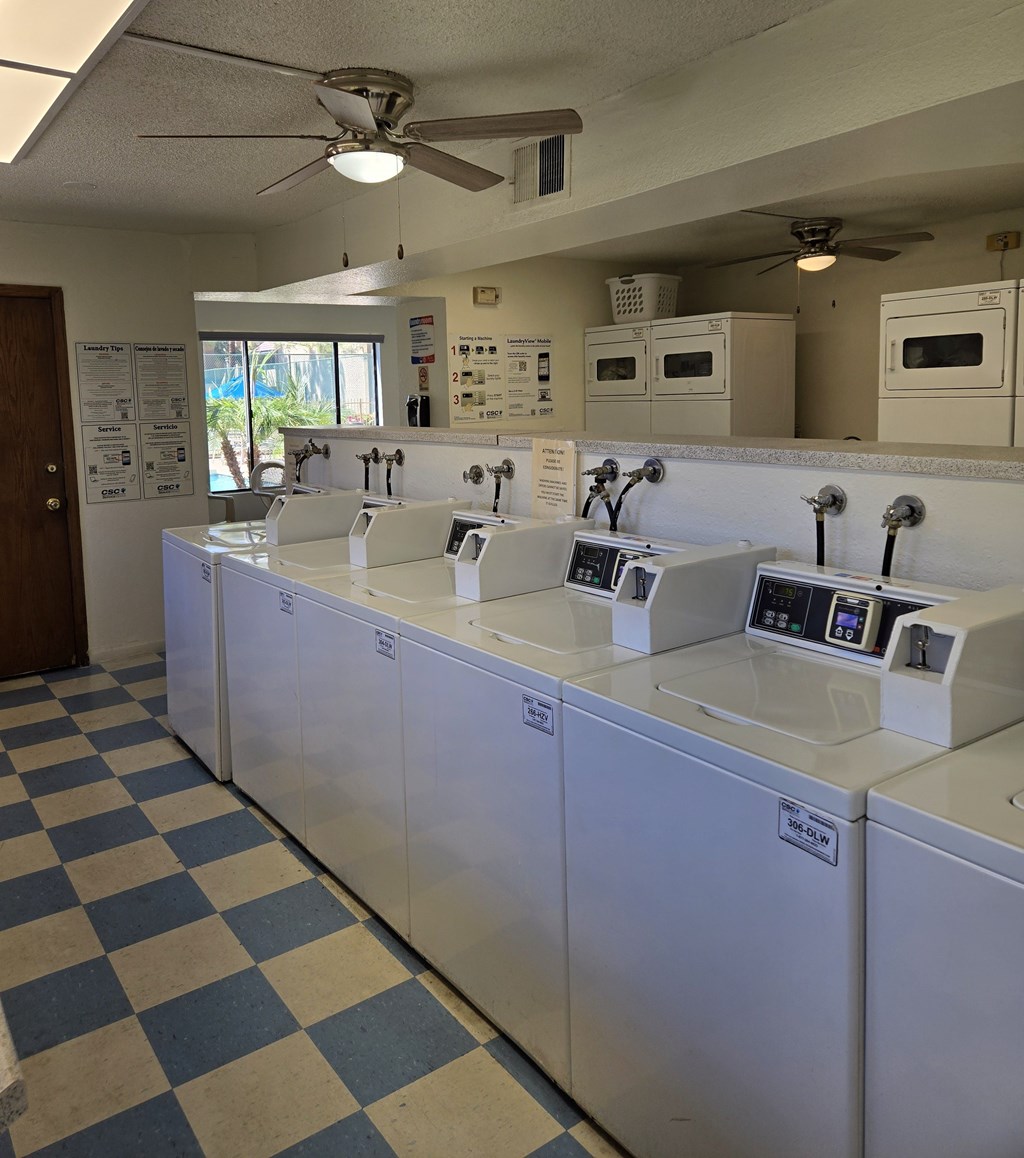 A row of sinks in a public washroom.