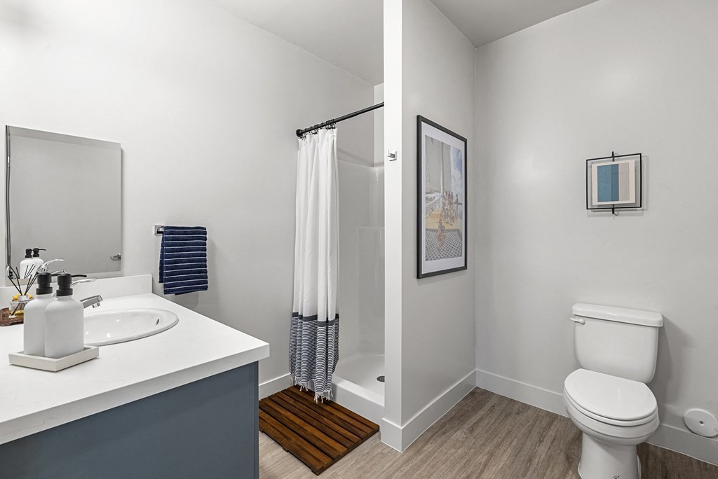 a bathroom with a shower and a sink and a toilet at SECOND AVE COMMONS | BRAND-NEW, Mesa, Arizona