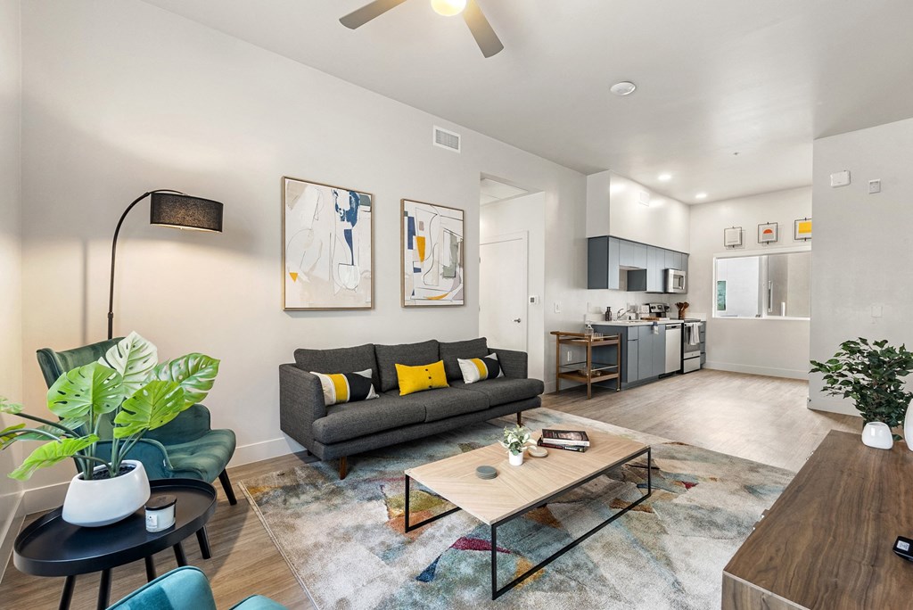 a living room with a couch and a coffee table at SECOND AVE COMMONS | BRAND-NEW, Arizona