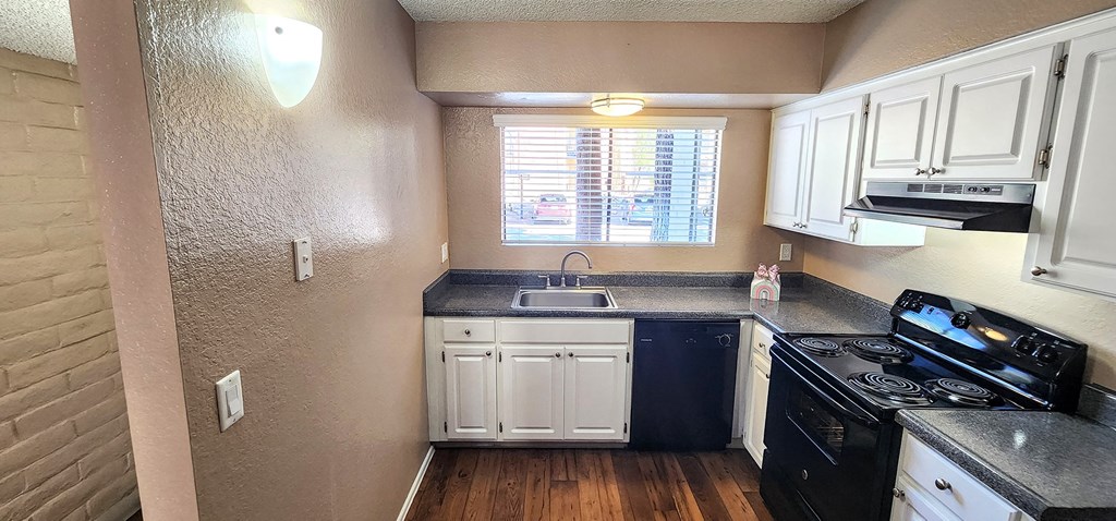 2x2 Downstairs Brown Upgrade Kitchen at Mission Palms Apartment Homes in Tucson AZ