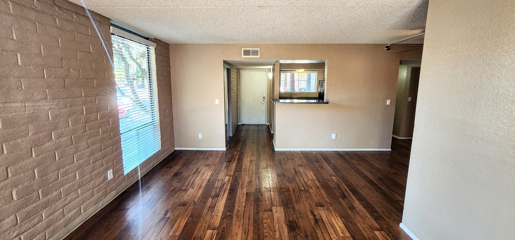 2x2 Downstairs Brown Upgrade Living Room at Mission Palms Apartment Homes in Tucson AZ