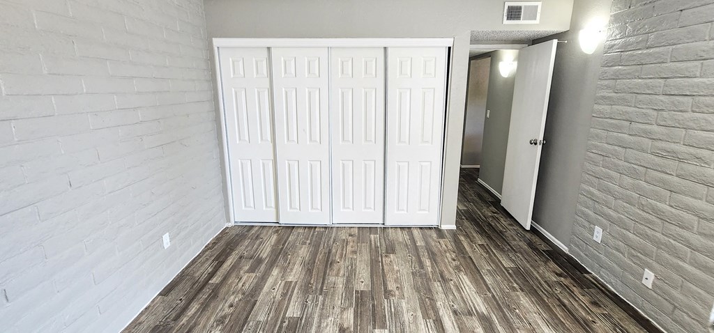 2x2 Downstairs Bryten Upgrade Guest Bedroom with Closets at Mission Palms Apartment Homes in Tucson A