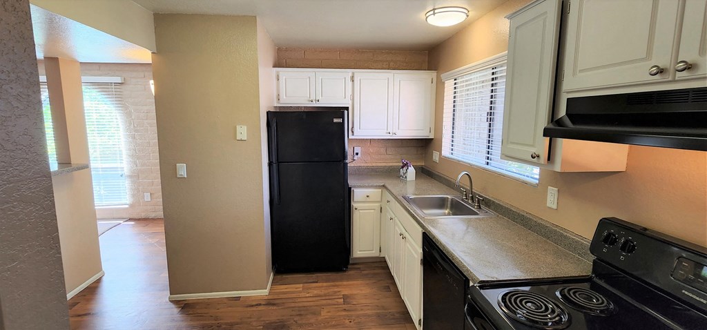 2x2 Upstairs Brown Upgrade Kitchen at Mission Palms Apartment Homes in Tucson AZ