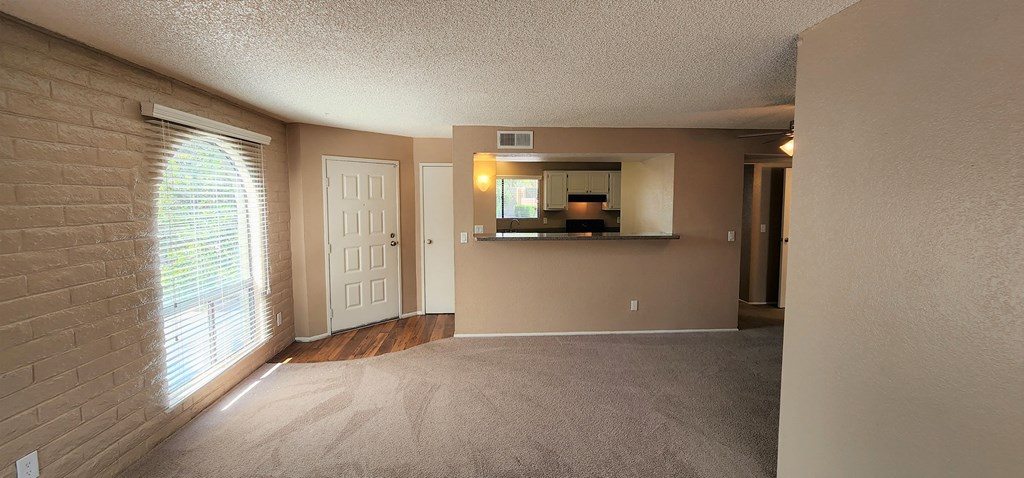 2x2 Upstairs Brown Upgrade Living Room at Mission Palms Apartment Homes in Tucson AZ