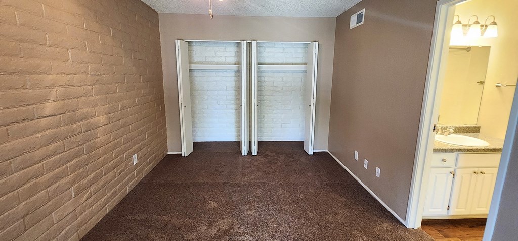 2x2 and a half Bath Brown Upgrade First Main Bedroom with Closets at Mission Palms Apartment Homes in Tucson AZ