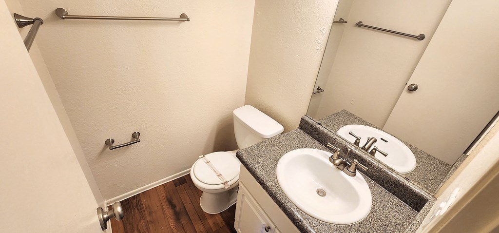 2x2 and a half Bath Brown Upgrade Half Bathroom at Mission Palms Apartment Homes in Tucson AZ