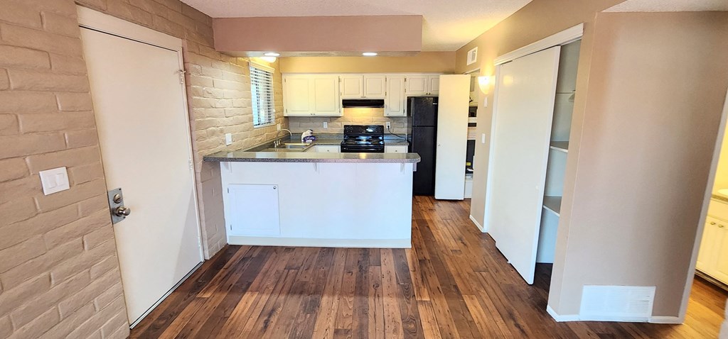 2x2 and a half Bath Brown Upgrade Kitchen at Mission Palms Apartment Homes in Tucson AZ