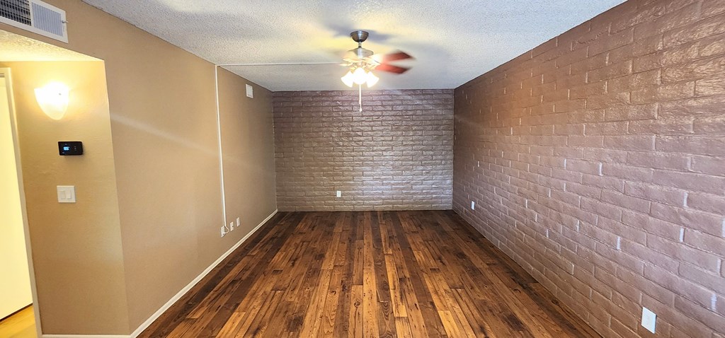 2x2 and a half Bath Brown Upgrade Living Room at Mission Palms Apartment Homes in Tucson AZ