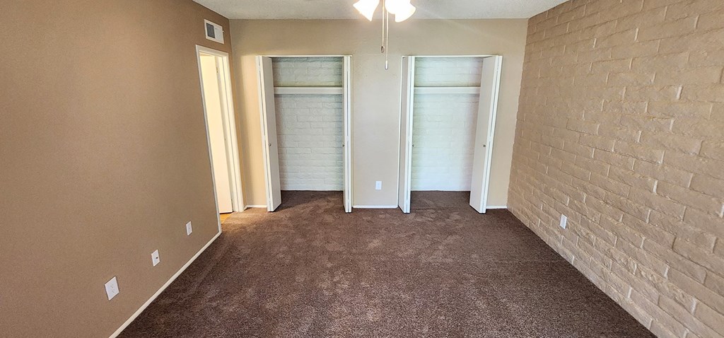 2x2 and a half Bath Brown Upgrade Second Main Bedroom with Closets at Mission Palms Apartment Homes in Tucson AZ