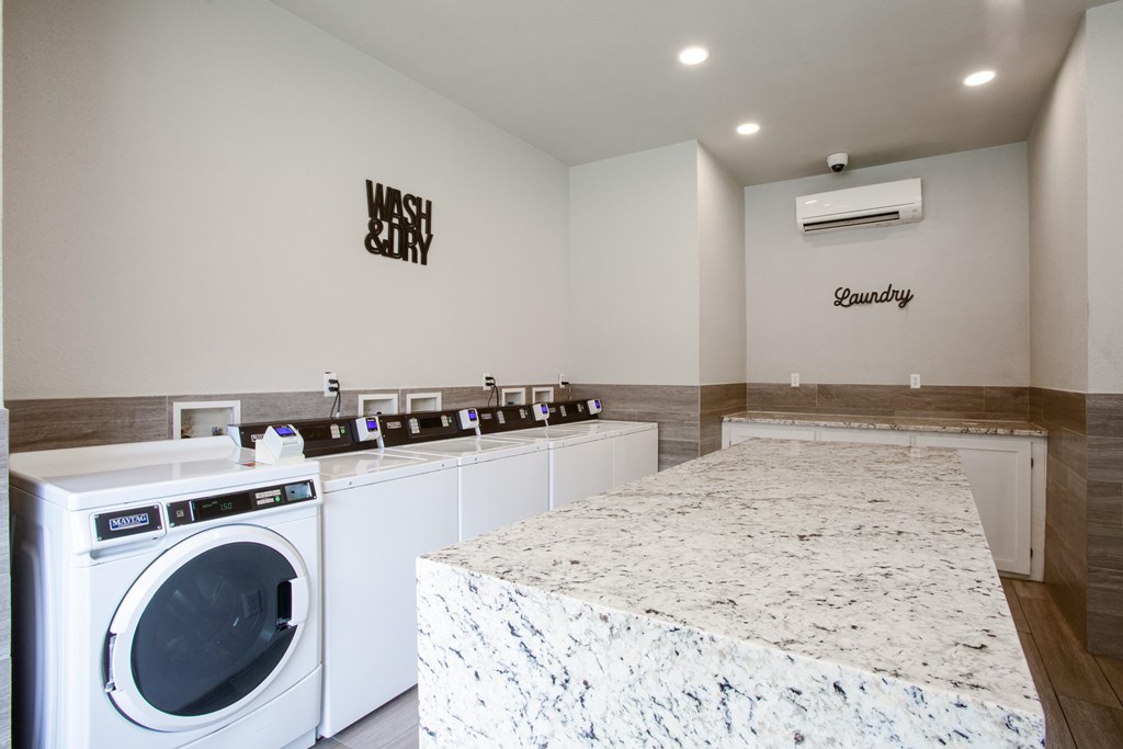 A laundry room with a washing machine and dryer.
