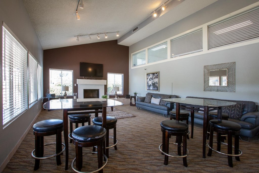 A living room with a fireplace and a couch.