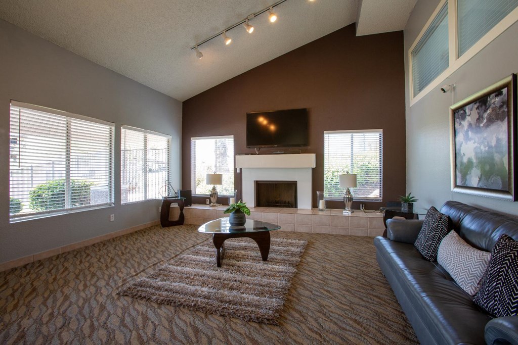 A living room with a fireplace and a couch.