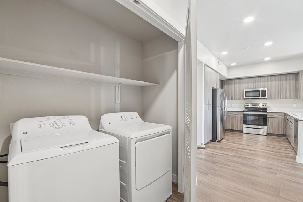 A laundry room with a washer and dryer.