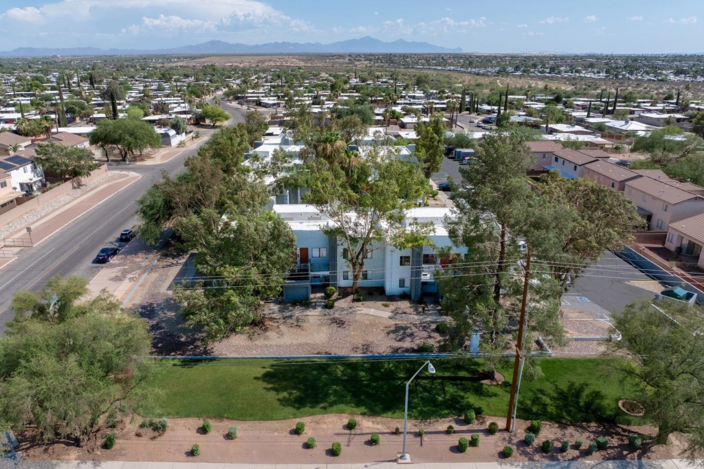 A residential area with houses and trees.