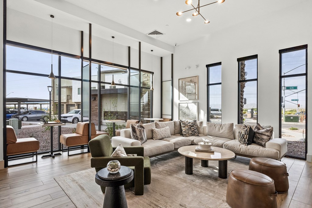 A living room with a large couch and a coffee table.