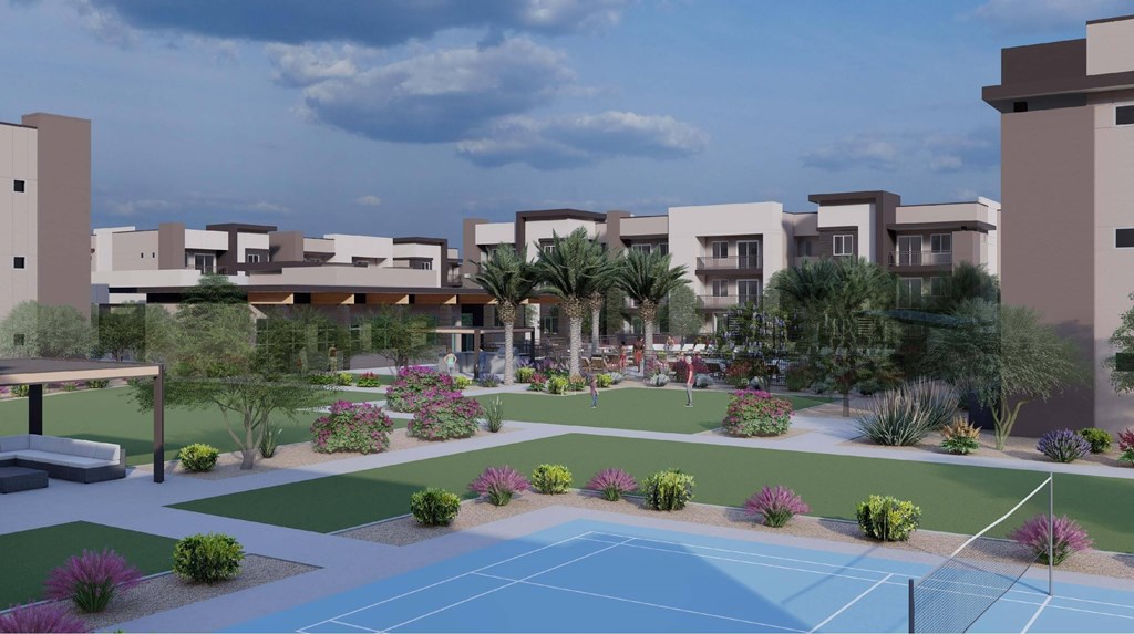 A tennis court is surrounded by a landscaped area with bushes and trees.