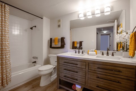 Bathroom with double vanity at Los Altos Towers Apartments in Albuquerque NM